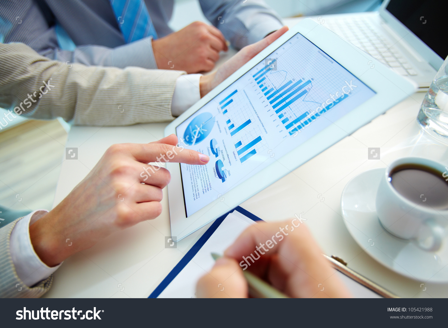 stock-photo-business-people-meeting-to-discuss-the-situation-on-the-market-105421988